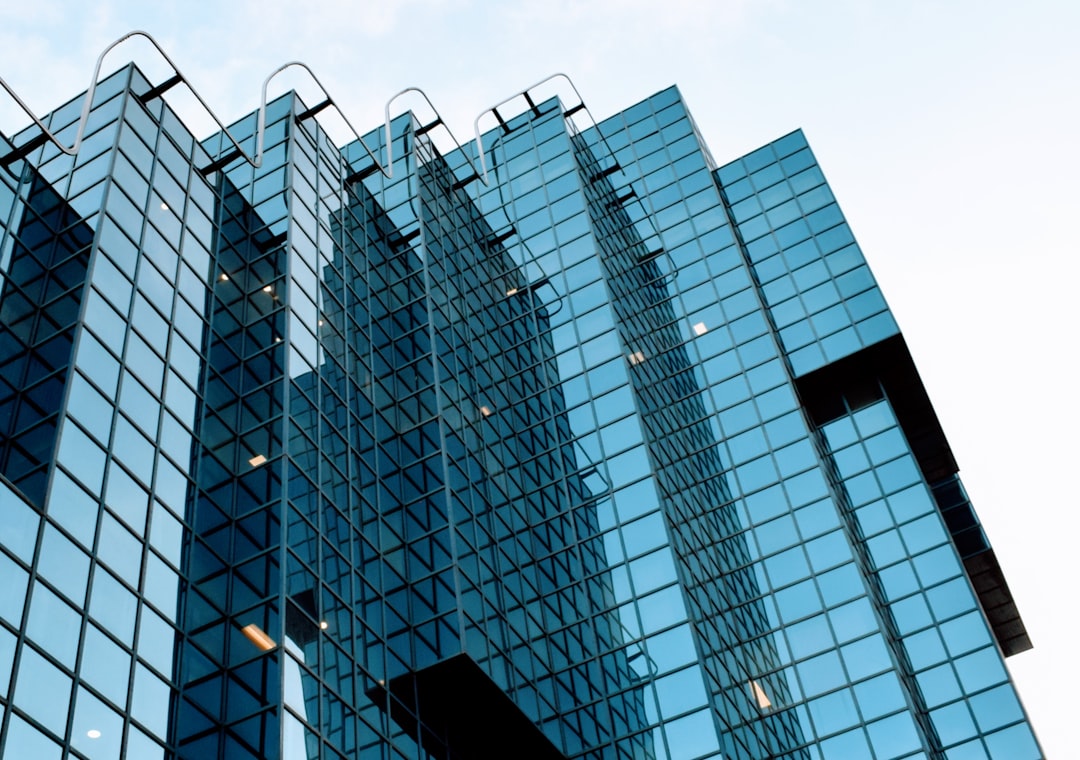low-angle photo of high-rise building during daytime