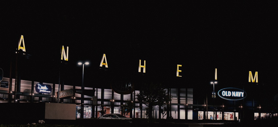 the outside of a building lit up at night