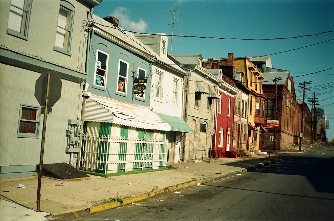 A street lined with colorful buildings.