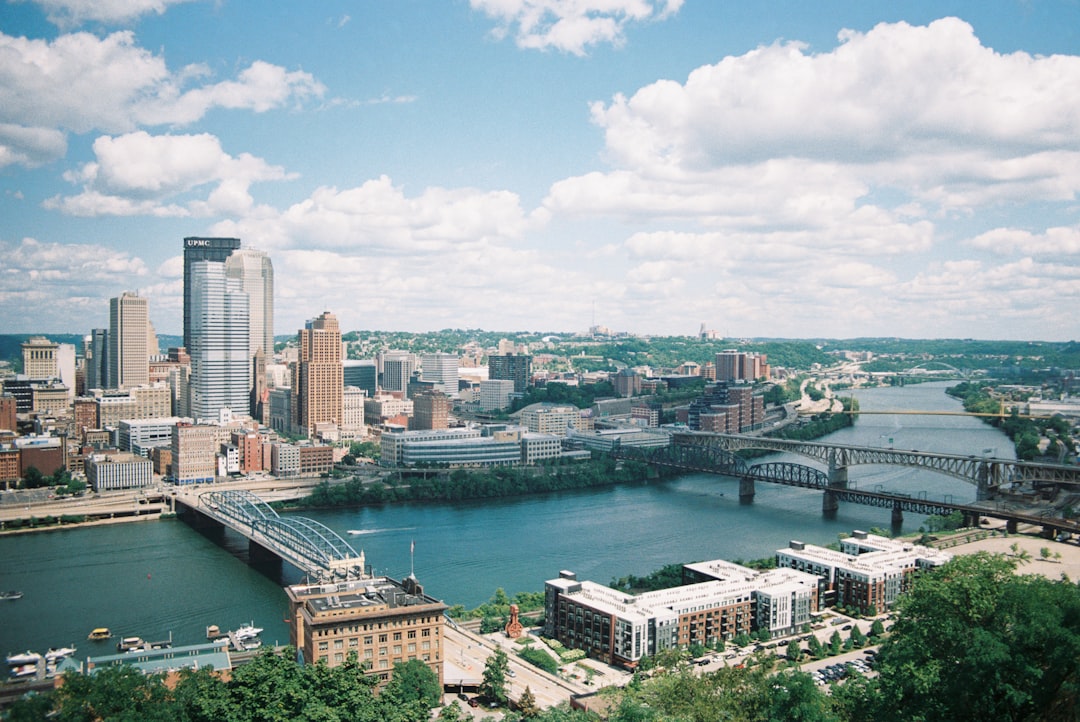 A view of a city with a bridge over a river