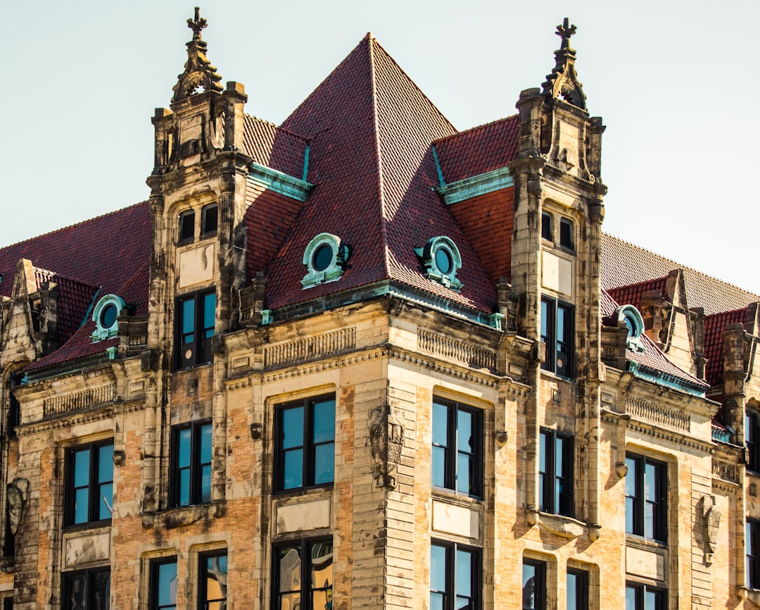 a large building with a clock on the front of it