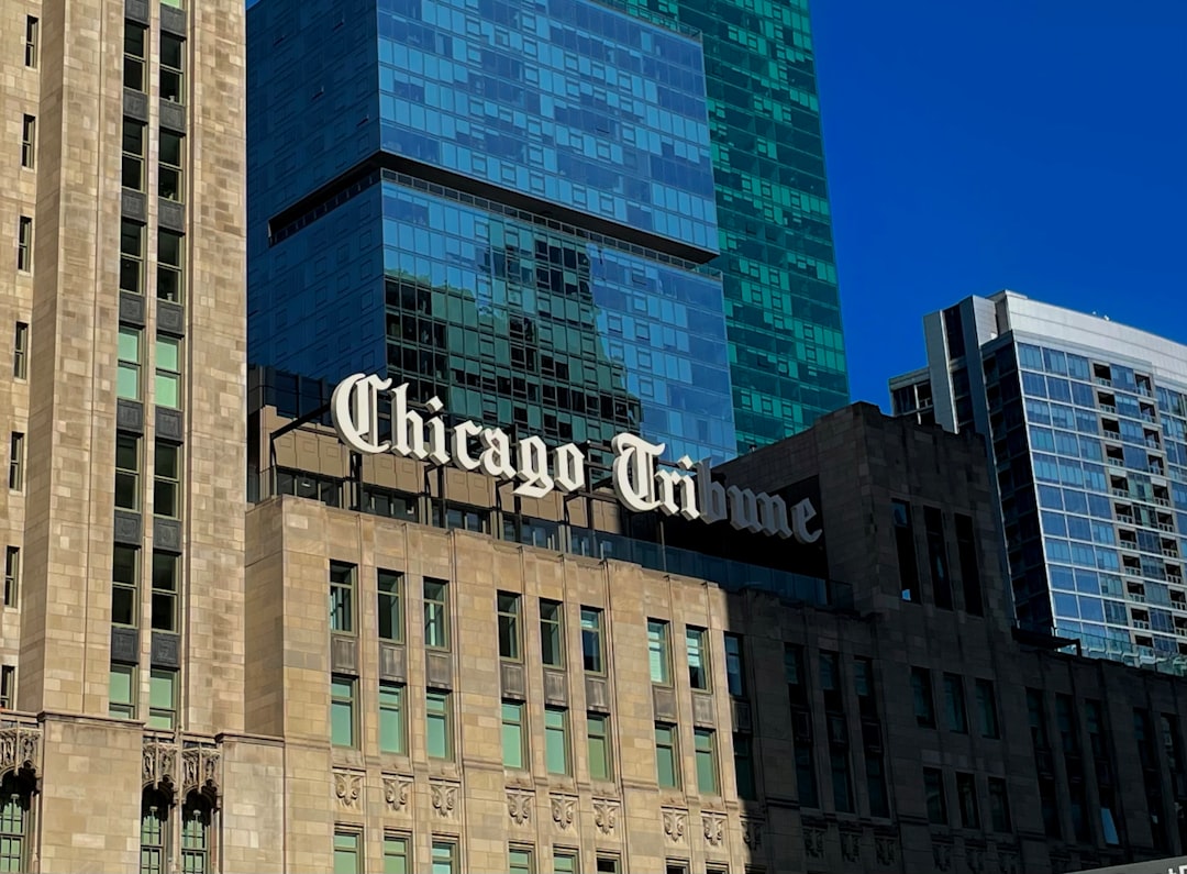 a very tall building with a sign on top of it